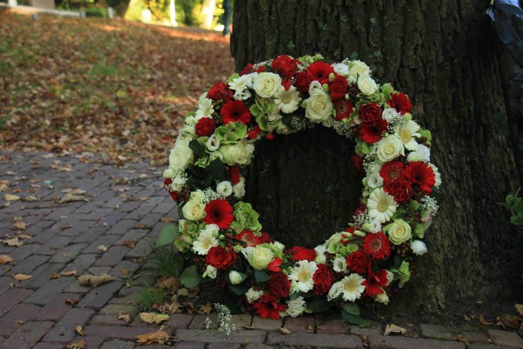 Sympathy wreath near a tree